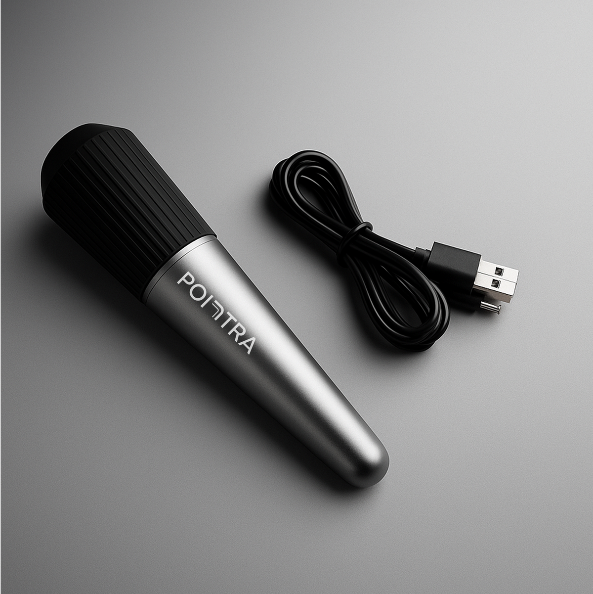 TensCare Pointra device with its coiled USB charging cable