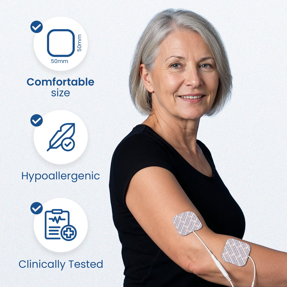 Woman wearing a 50 x 50 mm electrode pad on her upper arm; comfortable size, hypoallergenic, clinically tested
