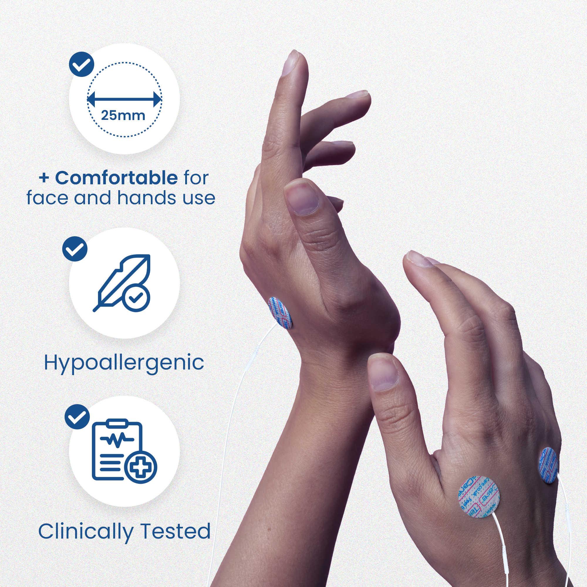 Hands wearing 25 mm round electrode pads; comfortable for face and hands, hypoallergenic, clinically tested