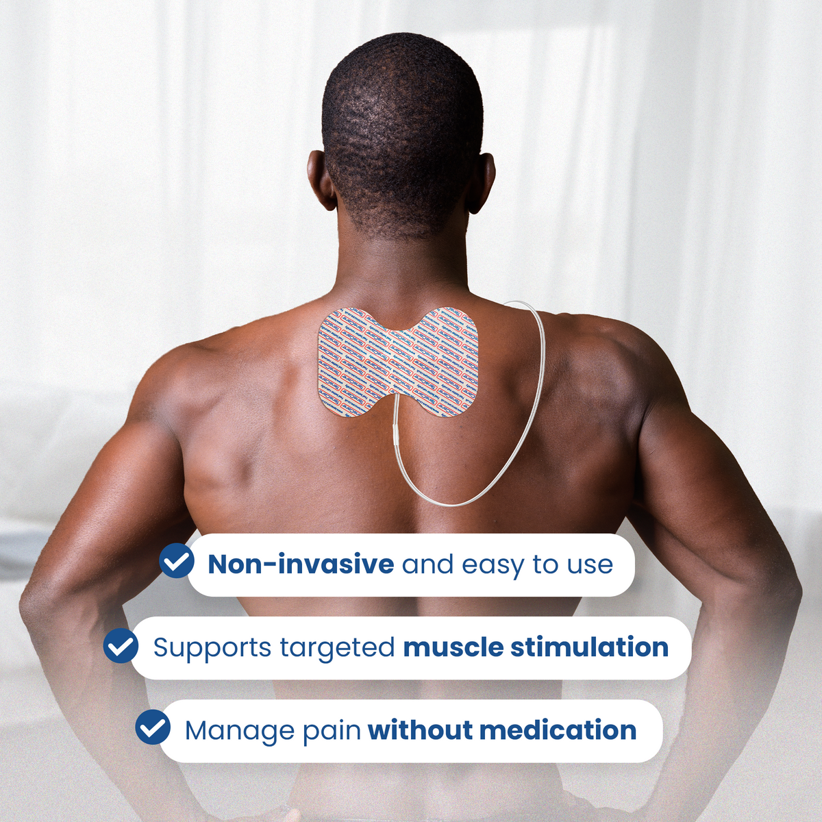 Man wearing a butterfly electrode across his upper back for non-invasive targeted muscle stimulation