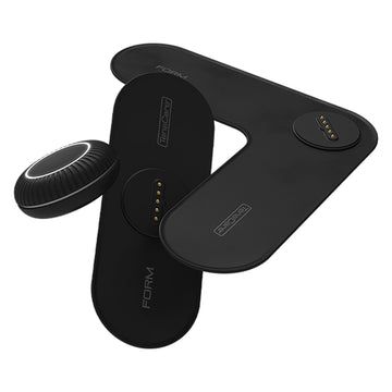 TensCare FORM wireless EMS device with its black pod and bespoke electrode pads