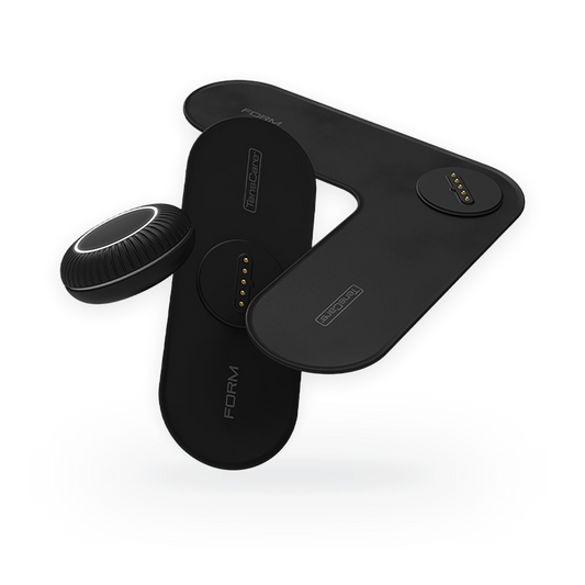 TensCare FORM wireless EMS device with its black pod and bespoke electrode pads