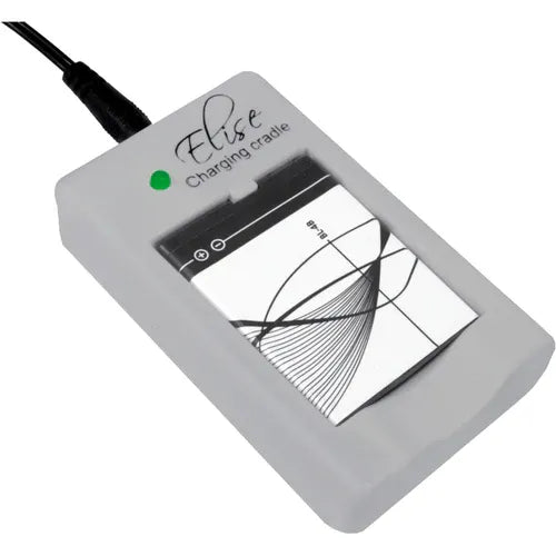 TensCare Elise charging cradle with a battery seated in it and the green charge light lit