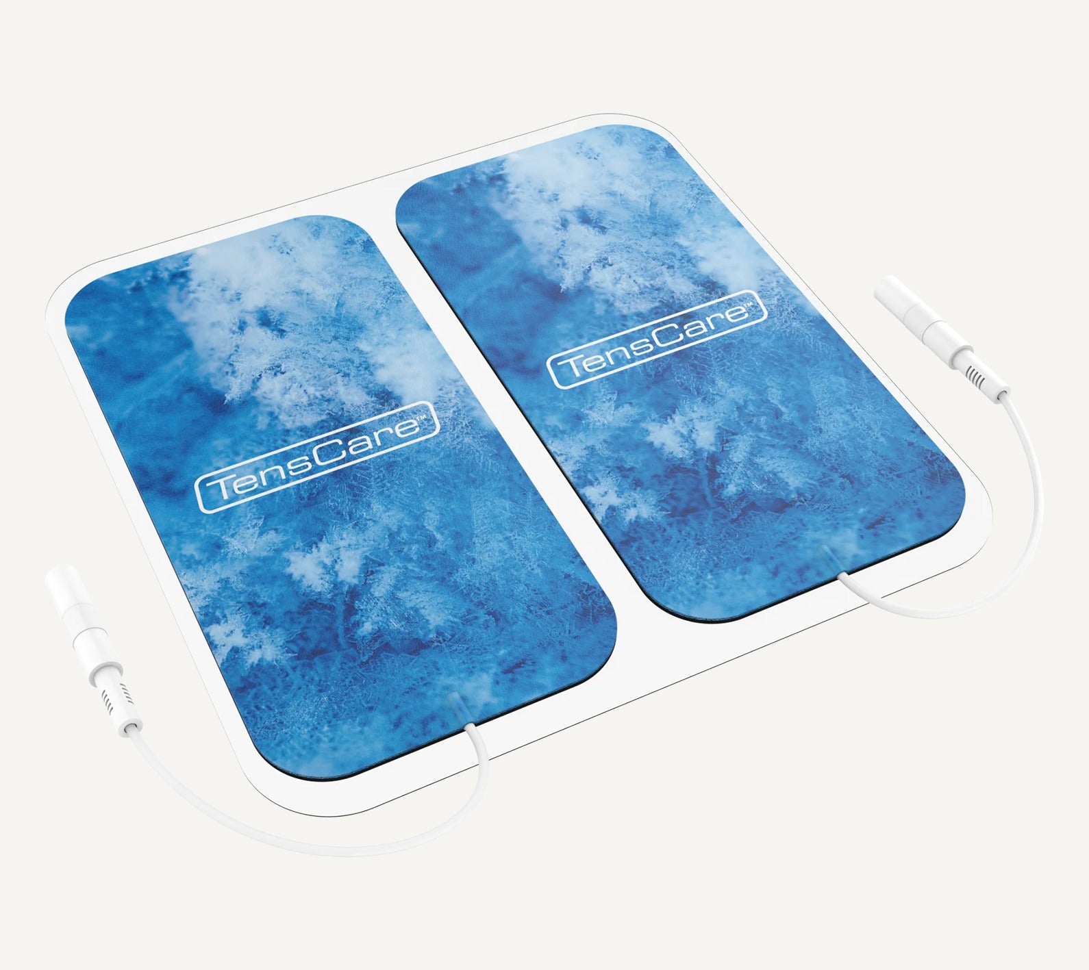 TensCare Cool Relief electrode pads shown at an angle on their backing liner