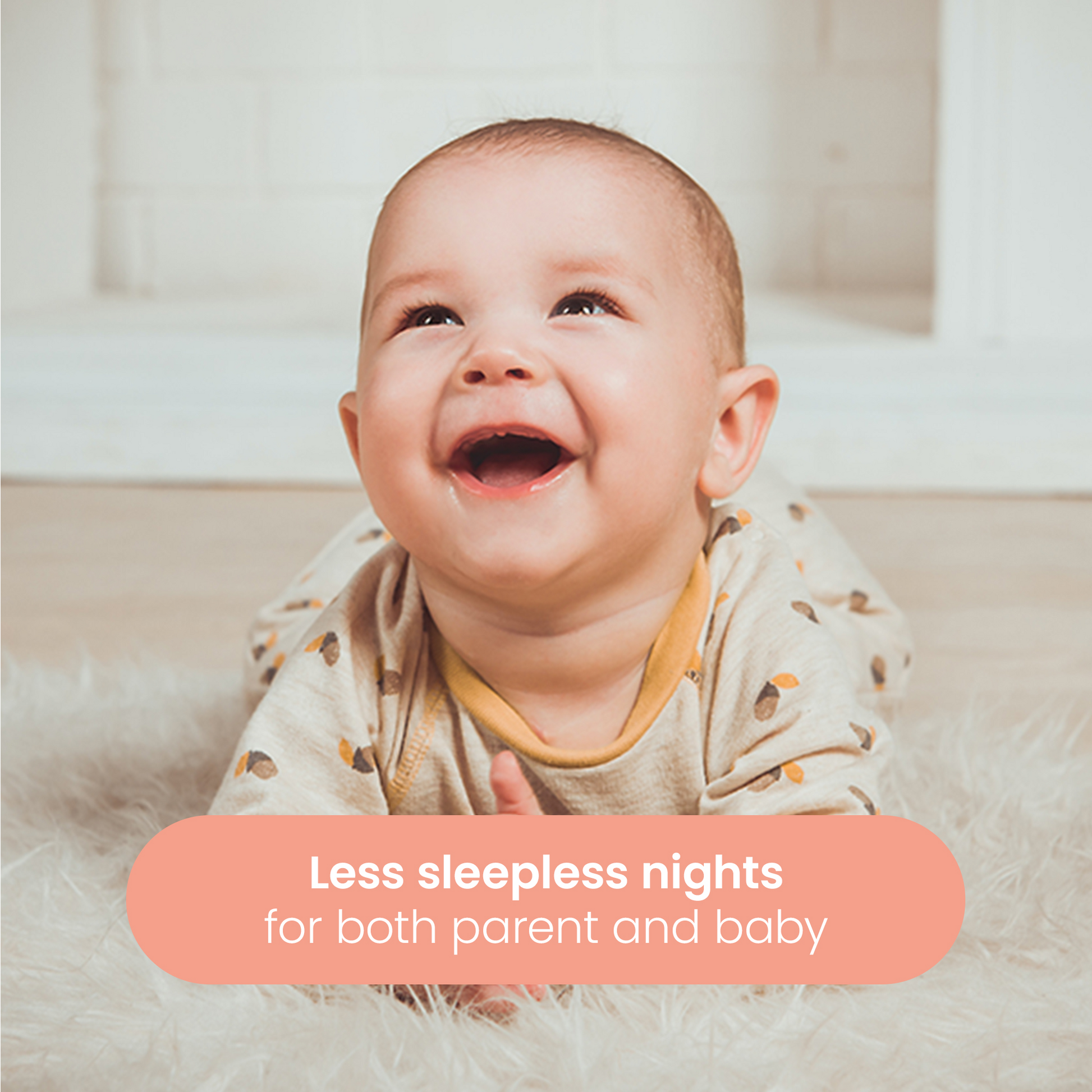 Smiling baby lying on a rug, captioned less sleepless nights for both parent and baby