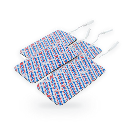 Four TensCare 50 x 90 mm electrode pads with lead wires, stacked